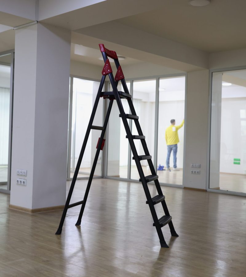 High,Ladder,Standing,In,Center,Of,Empty,Office.,Rent,New High,Ladder,Standing,In,Center,Of,Empty,Office.,Rent,New