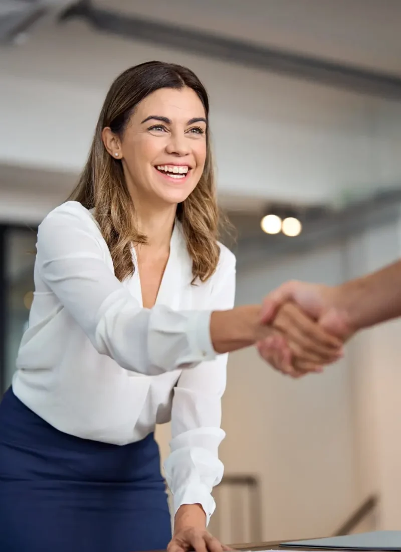 Happy,Mid,Aged,Business,Woman,Manager,Handshaking,Greeting,Client,In